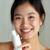 Sara Lim holding product